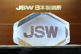 The Japan Steel Works (JSW) signboard and logo.